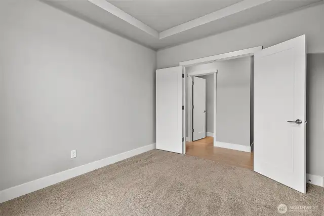Tucked away office  on the main floor with French doors.