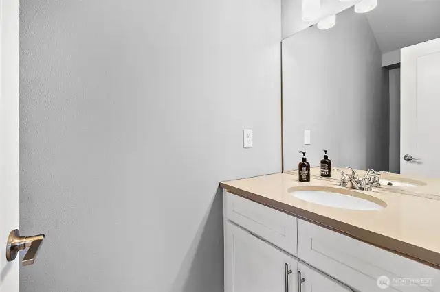 A conveniently located downstairs bathroom, offering privacy away from the main area while perfectly positioned next to the office for added functionality.