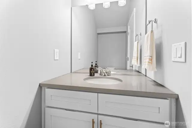 A conveniently located downstairs bathroom, offering privacy away from the main area while perfectly positioned next to the office for added functionality.