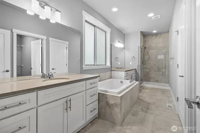 Ample storage in this primary bathroom suite!