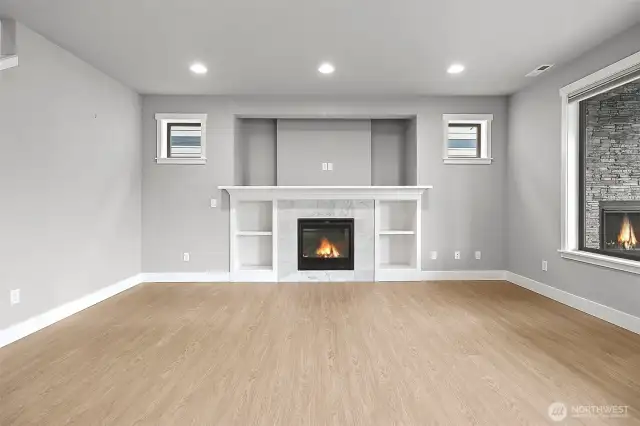 Cozy fireplace indoor and out, with neutral tones throughout-perfect for customizing to your style!