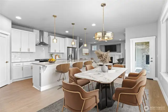 Ample dining space, with massive kitchen island and breakfast nook looking out on to the beautiful Tehaleh trails.