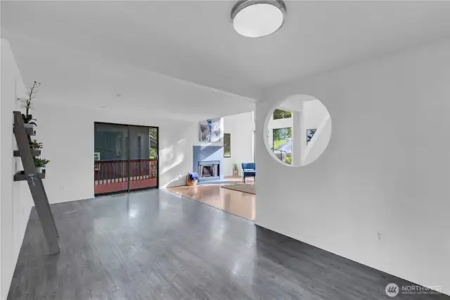 Dining room to living room and slider.