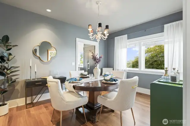 Brazilian Ipe wood floors flow throughout the main level, including this spacious and inviting dining room.
