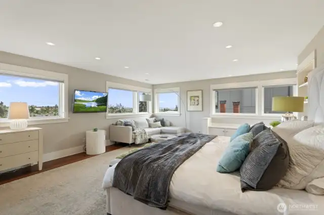 Wood floors, built-in window bench seating, ample room for a king-sized bed AND a seating area, and views for days - this is the ultimate in-city retreat.