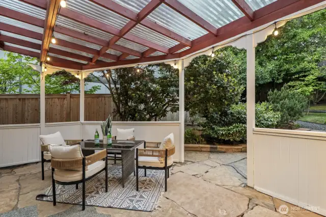 This second patio space is covered for year-round enjoyment.