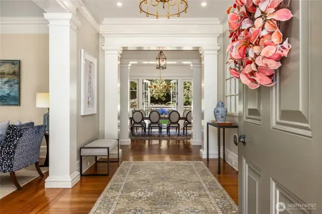 Looking into the home from the front door-straight ahead is the fomal dining room with French doors that open to the back garden.