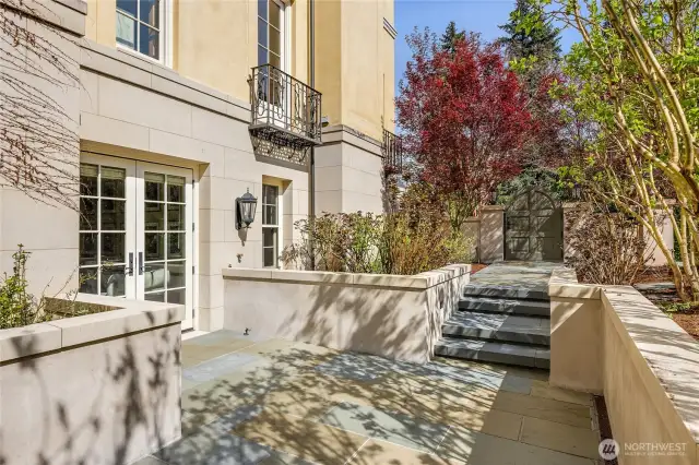 Here is the guest suite patio and the steps leading out to the gate.