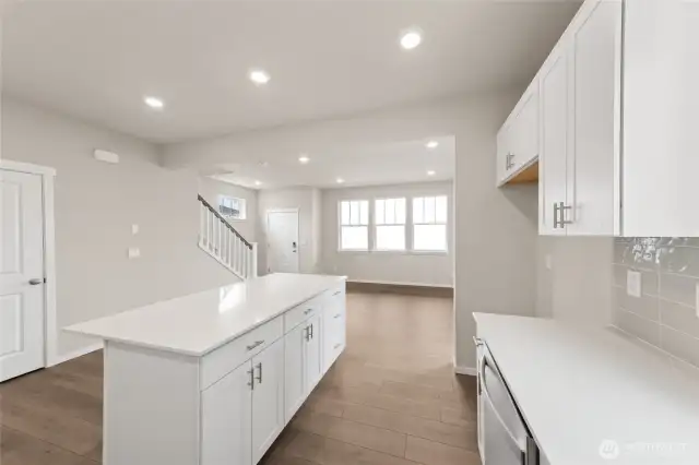This crisp and functional kitchen offers room to move, work, and entertain with ease.  Pictures are for representational purposes only, colors and features may vary.