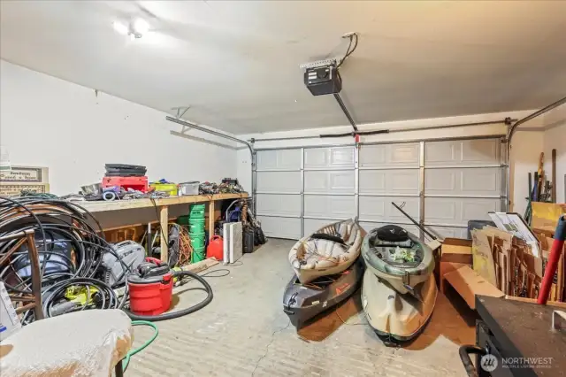 2 Car Garage With Electric Door Opener.