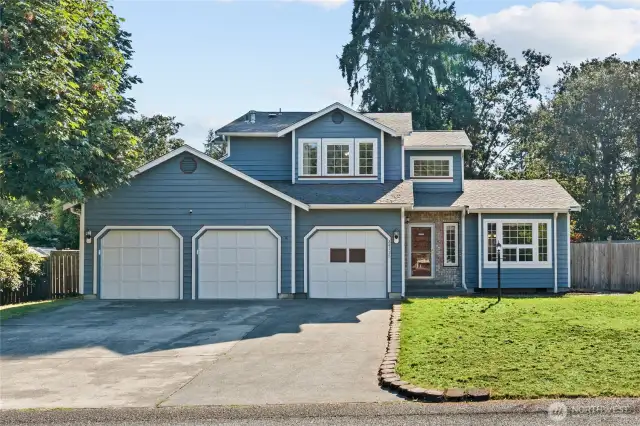 Warm and welcoming home that checks all the boxes. It has a well designed floorplan, 3 bay garage, large lot, and a great location.