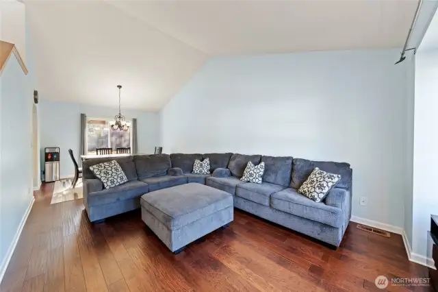 This space has vaulted ceilings and is much larger than it looks. Front and back windows bring in plenty of natural light.