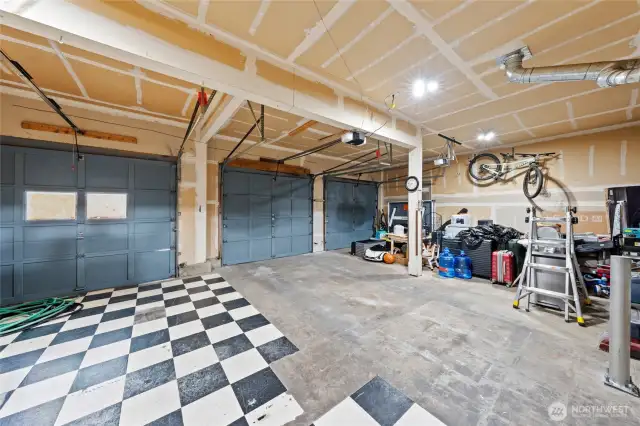 Huge 3 bay garage gives you plenty of space for indoor parking and storage for all your toys.