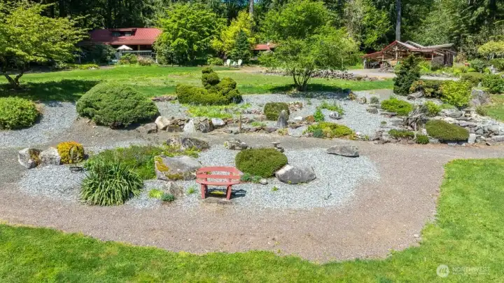 Rock garden with waterfall pond is only one of the focal points.