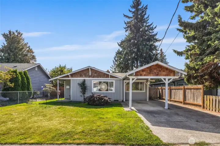 Impeccably maintained and full of charm — this rambler stuns from the street with standout curb appeal and pride of ownership throughout.