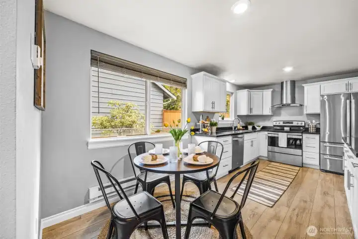 Dining area connected to the renovated kitchen.