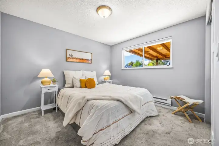 Another sizable bedroom with an attached full bathroom.
