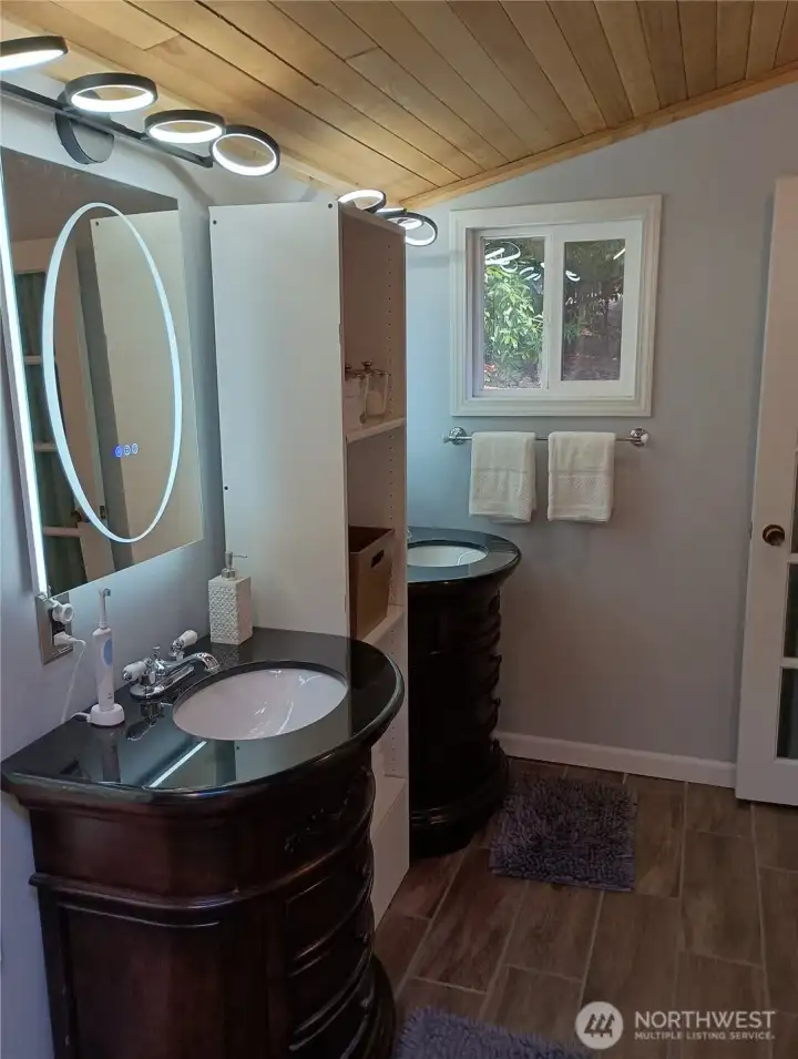 Dual vanities and LED lighted/anti fog mirrors.