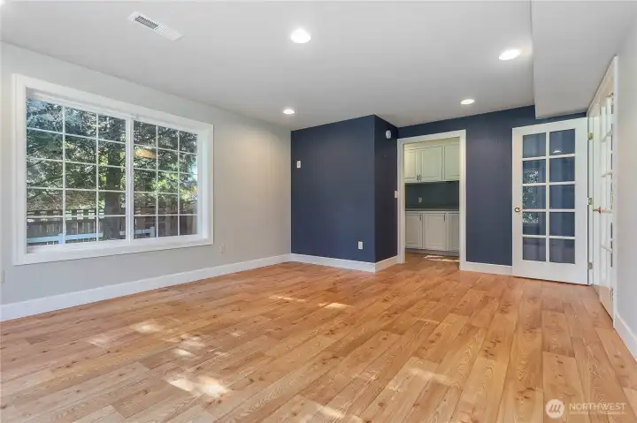 The exercise room is light and bright.