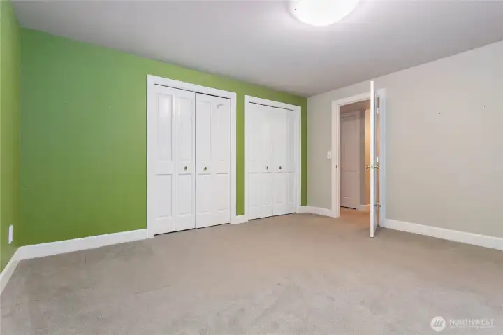 Bedroom #4 located downstairs.