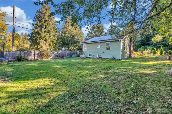 View from the southwest corner of the lot looking toward the home.