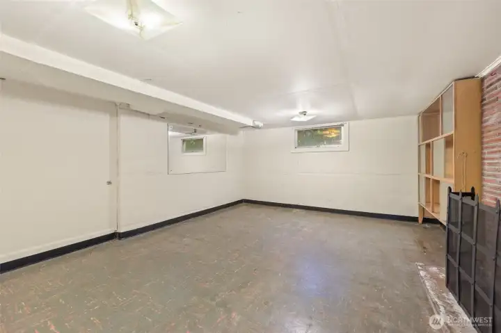 The expansive unfinished basement offers endless potential.