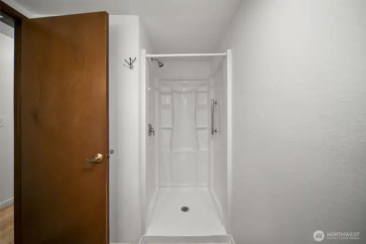 New walk-in shower in guest bathroom.