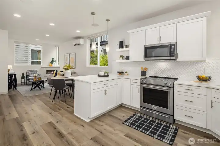 Note staging has been removed. Great room vibes with huge windows to let in the sunshine!