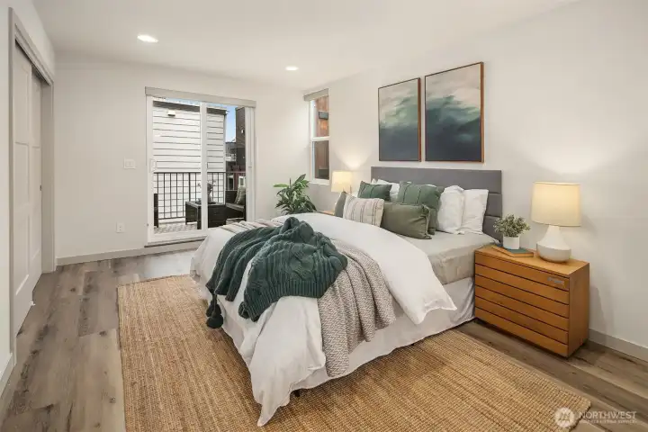 Upper level primary suite with dreamy closets, spa bath with double sinks, and private terrace!