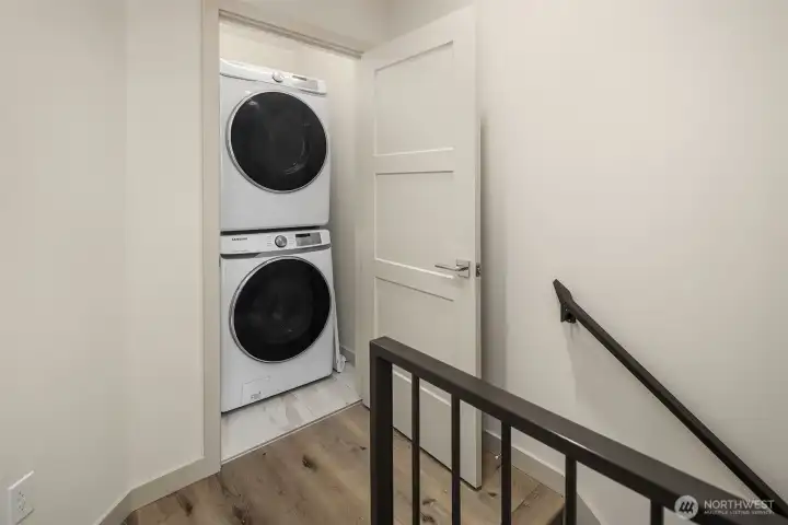 Full size washer/dryer on second level.
