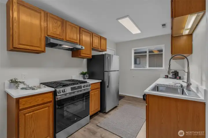 Cooking with gas, new counter tops, new and appliances.