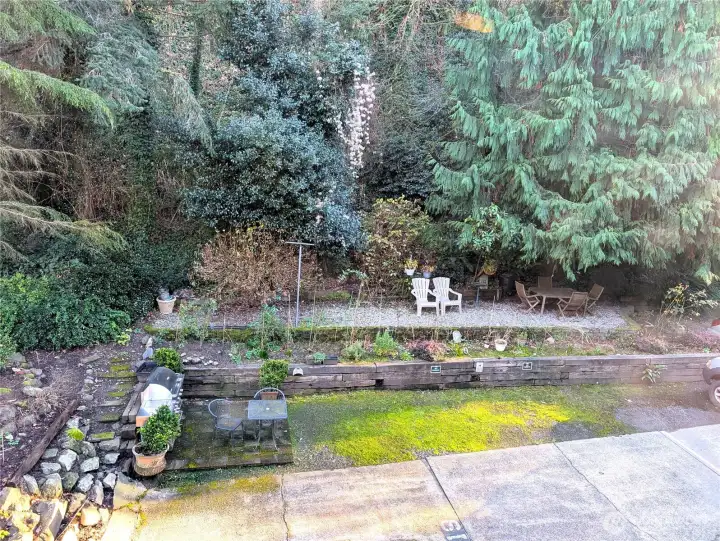 Looking from the dining area over part of the common area & community (dedicated) parking lot.