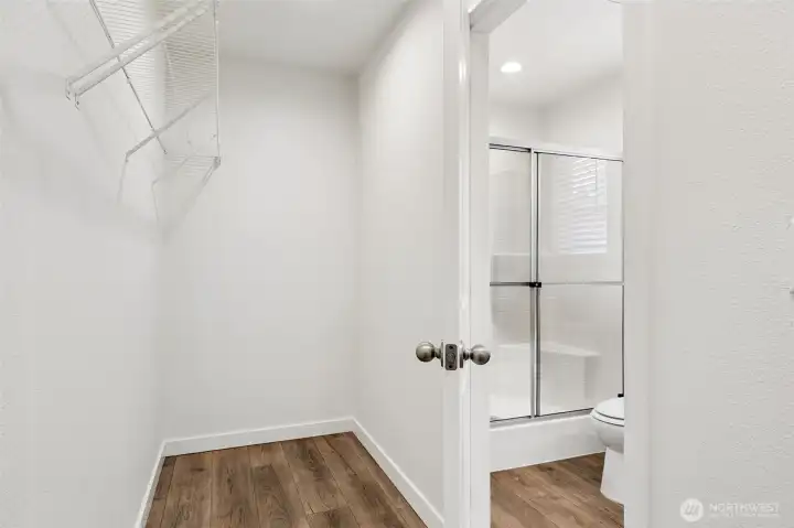 Primary walk in closet.