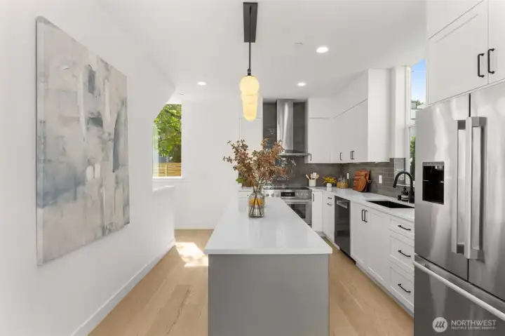 Abundant cabinet storage and expansive counter space make meal prep a breeze.
