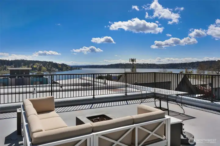 Just 1 floor up from the unit, find the awesome roof deck (rarely used with just 7 neighbors in the building) overlooking Lake Washington!