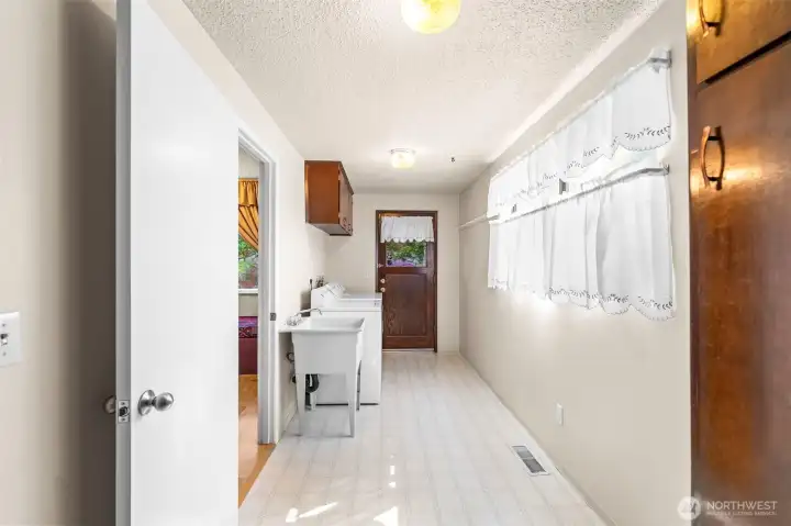 Convenient entry to the utility room from the garage or backyard.