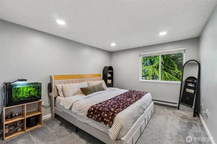 King size bed easily fits in the larger bedroom