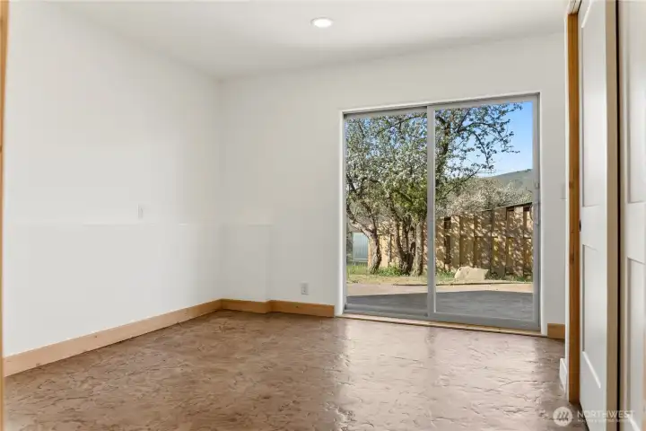 Primary bedroom with sliding door to the patio