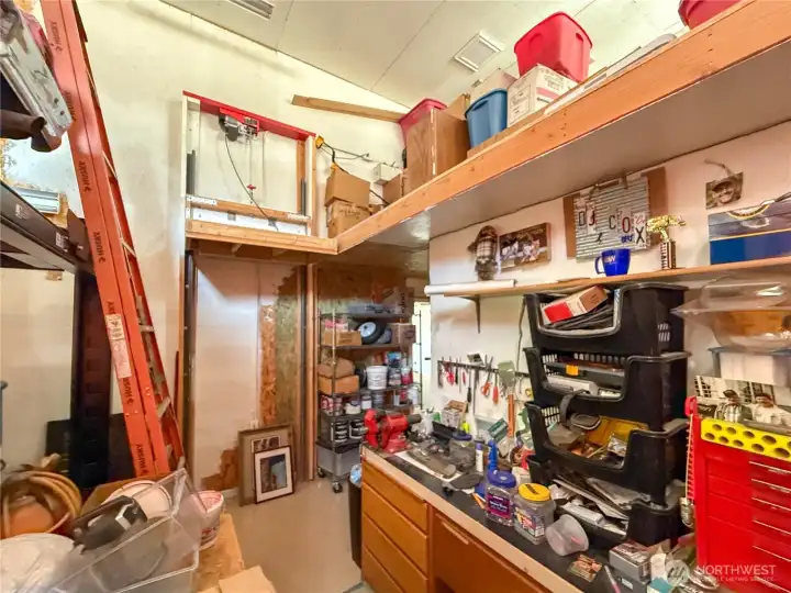 Shop bay 3 Elevator and storage loft.