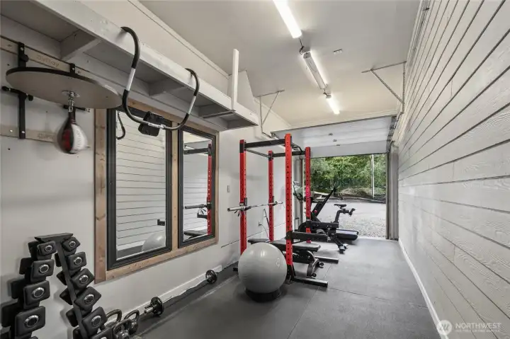 Additional room off of the shop currently used as a home gym.