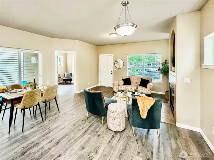 In this photo you see the den/office and slider that opens to the covered side patio with access to the side and rear yard areas.