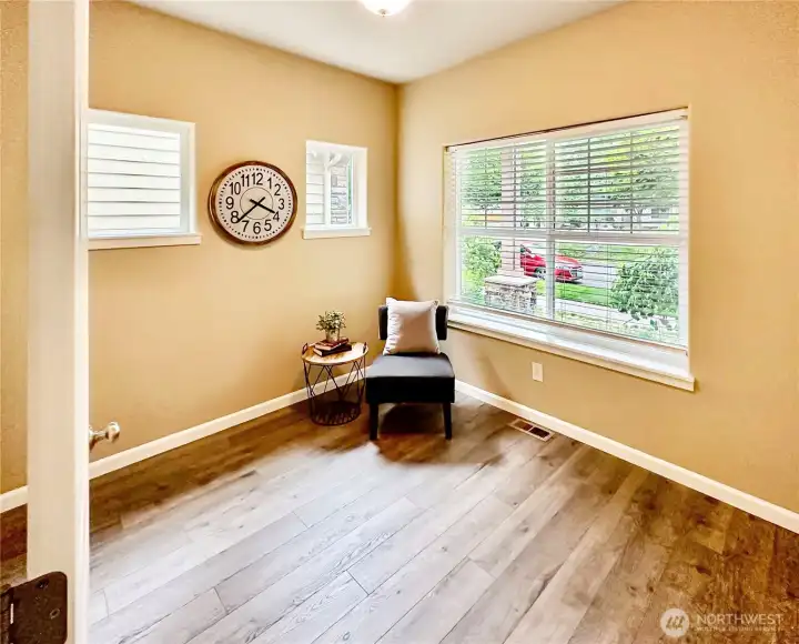 Close up view of the main floor den/office with laminate floor.