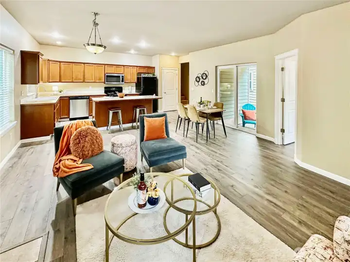 Great room and slider access to covered patio view.