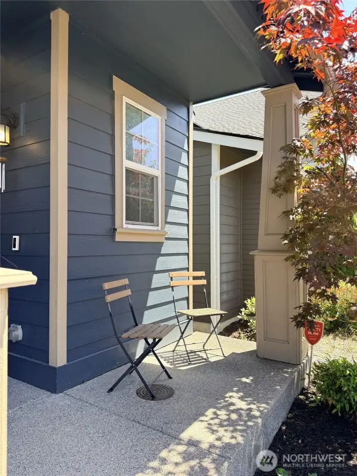 Welcoming covered front porch with space to relax