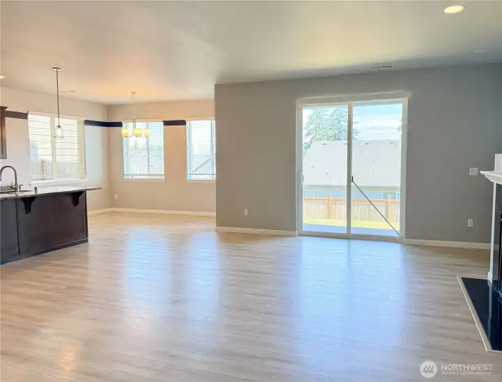Spacious great room with seamless flow to the kitchen and backyard