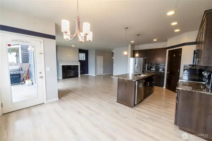 Bright dining area with easy access to the kitchen and outdoor living space.
