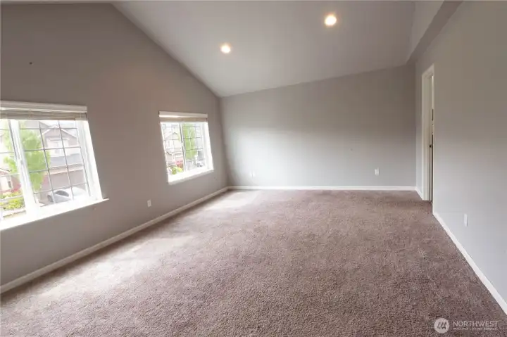 Expansive primary suite with abundant natural light and room to unwind.