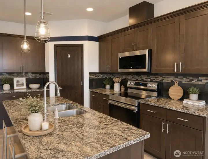 Spacious kitchen with granite countertops and a large center island