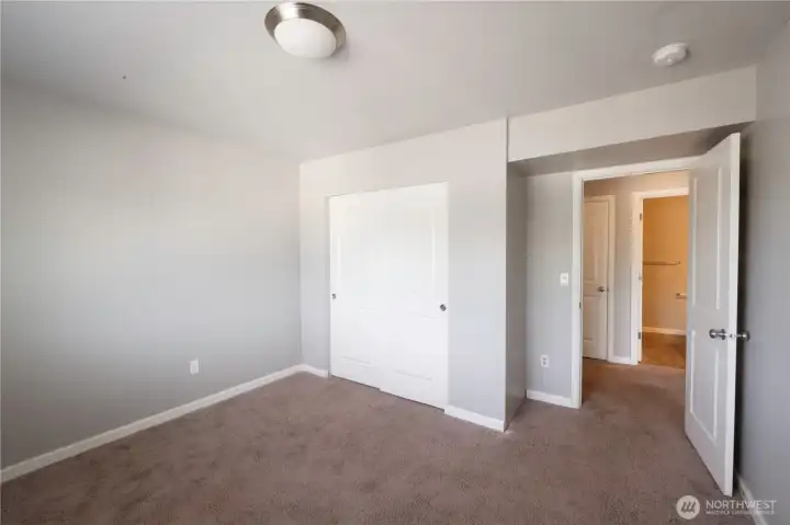 Secondary bedroom located on the upper level with convenient hall bath access.