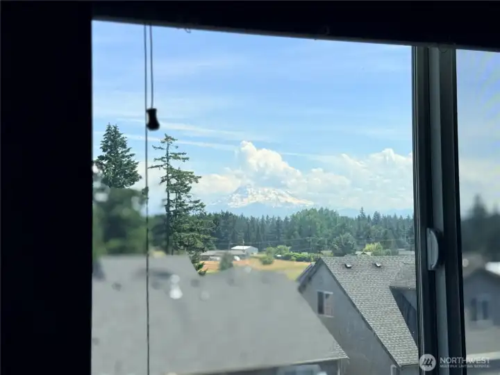 Enjoy stunning Mount Rainier views from the second-floor secondary bedroom